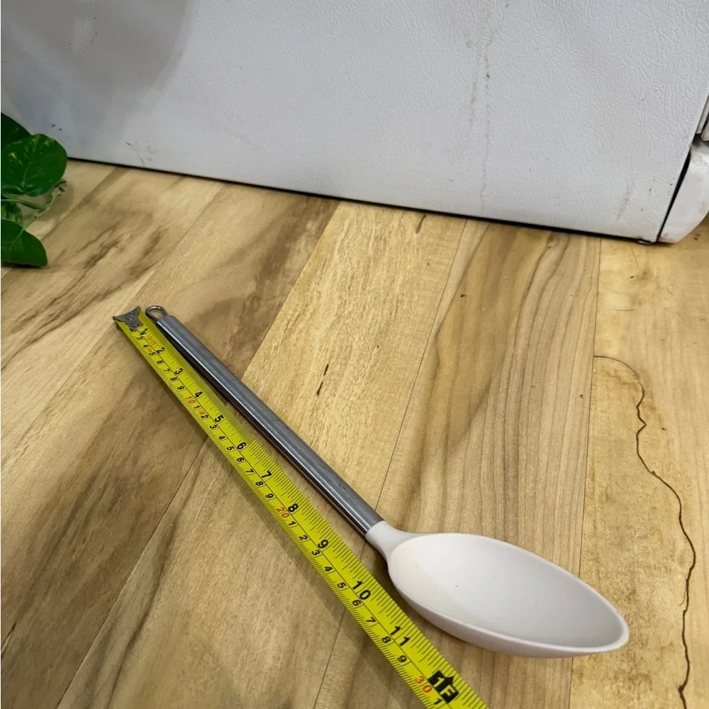 Elegant Silver and White Kitchen Spoon